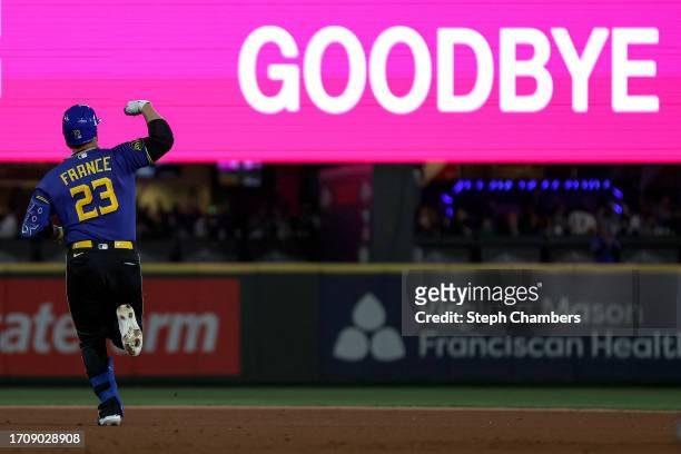 Ty France of the Seattle Mariners celebrates his solo home run during the third inning against the Texas Rangers at T-Mobile Park on September 29,...