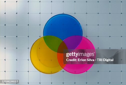 Technological background with glass discs in cmyk print patterns Technological background with glass discs in cmyk print patterns