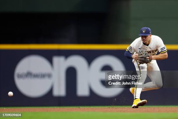 Willy Adames of the Milwaukee Brewers fields a ground ball during the game against the St. Louis Cardinals at American Family Field on September 28,...