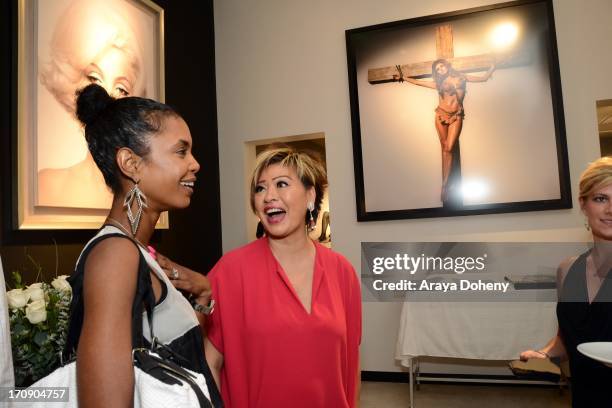 Kim Porter and Rosalina Lydster attend a gallery exhibit of Terry O'Neill Presents The Opus: A 50 Year Retrospective at Mouche Gallery on June 19,...