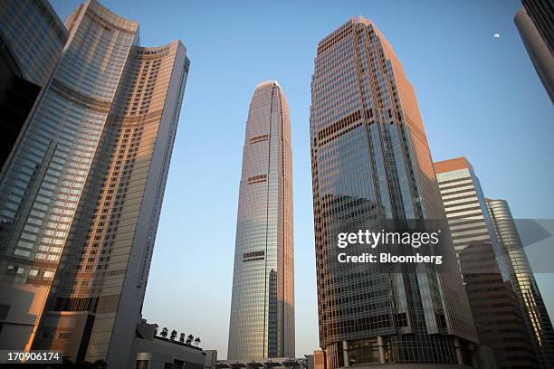 The Four Seasons hotel, from left, Two International Finance Centre , One International Finance Centre, and Exchange Square stand in the business...