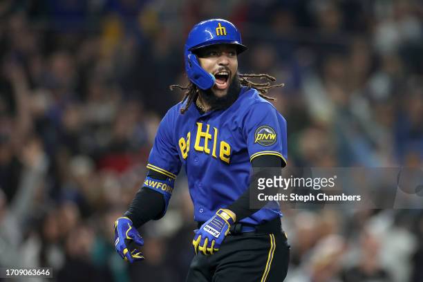 Crawford of the Seattle Mariners reacts after his grand slam during the fourth inning against the Texas Rangers at T-Mobile Park on September 29,...