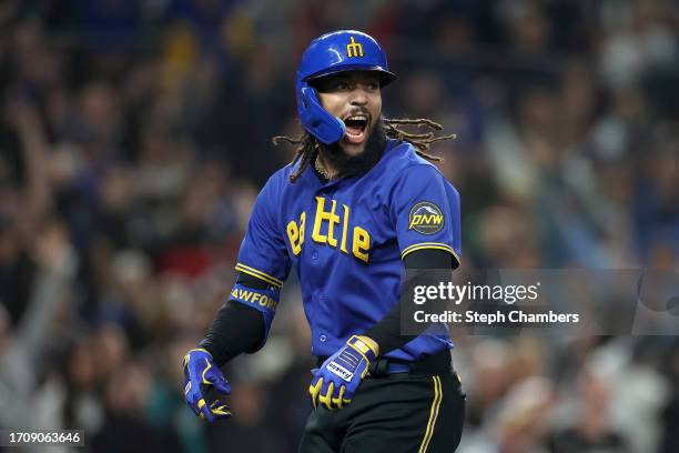 Crawford of the Seattle Mariners reacts after his grand slam during the fourth inning against the Texas Rangers at T-Mobile Park on September 29,...