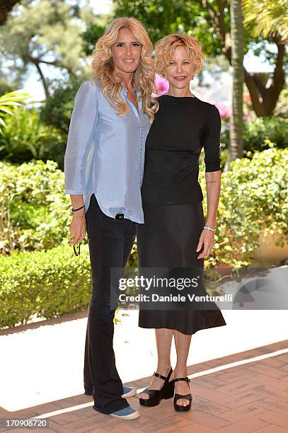 Meg Ryan and Tiziana Rocca attend a photocall as part of Taormina Filmfest 2013 on June 20, 2013 in Taormina, Italy.