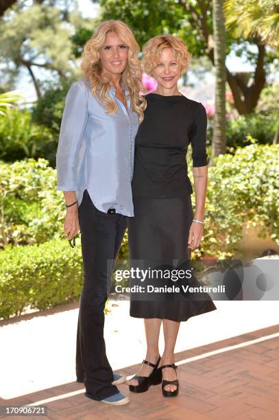 Meg Ryan and Tiziana Rocca attend a photocall as part of Taormina Filmfest 2013 on June 20, 2013 in Taormina, Italy.