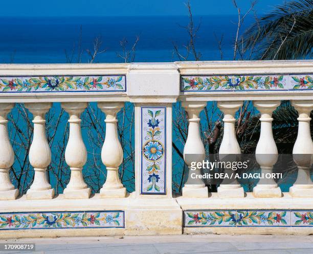 Painted majolica balustrade, promenade in Santo Stefano di Camastra, Sicily, Italy.