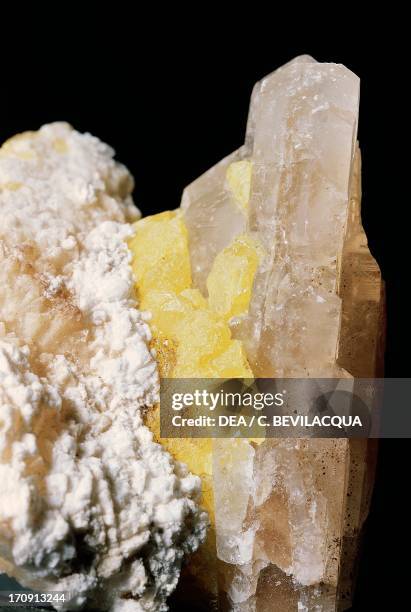 Sulfur, native element, with White Calcite, carbonate.