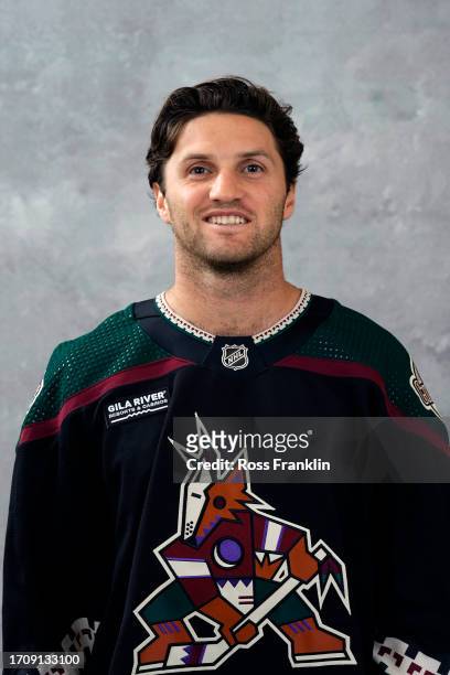 Alex Kerfoot of the Arizona Coyotes poses for his official headshot for the 2023-2024 season at Marriott McDowell Mountain Resort on September 13,...
