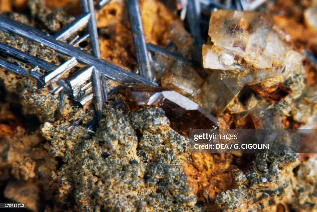 Monazite, phosphate, with Rutile, oxide...