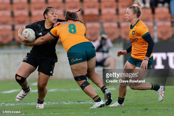Logo-I-Pulotu Lemapu Atai'i Brunt of New Zealand is tackled by Ashley Marsters of Australia during the Womens International Test Match between the...