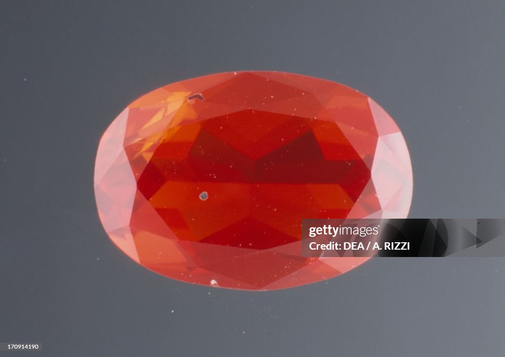 Fire Opal, oxide, cut gem...