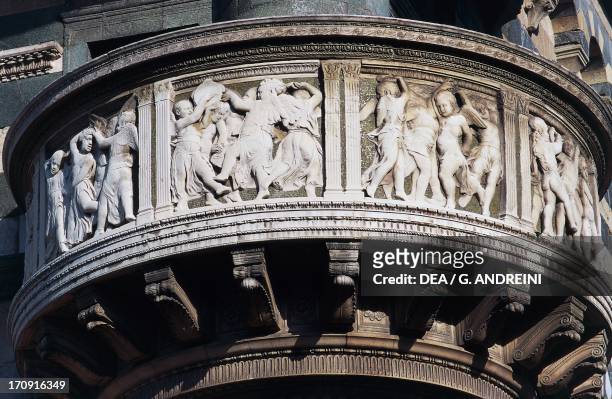 Pulpit of the Holy Girdle , reliefs with the Dance of the Putti, work by Michelozzo and Donatello , St Stephen's Cathedral, Prato, Tuscany, Italy.