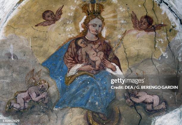 Madonna and Child with Angels, fresco, Colle Saint Lucia, Veneto, Italy.