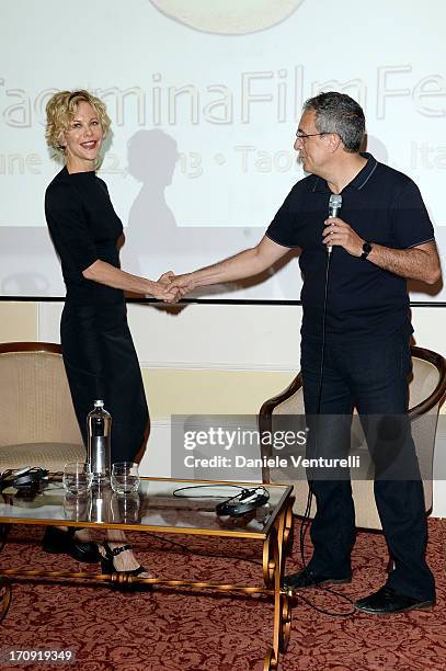Meg Ryan and Mario Sesti attend a TaoClass lecture as part of Taormina Filmfest 2013 on June 20, 2013 in Taormina, Italy.