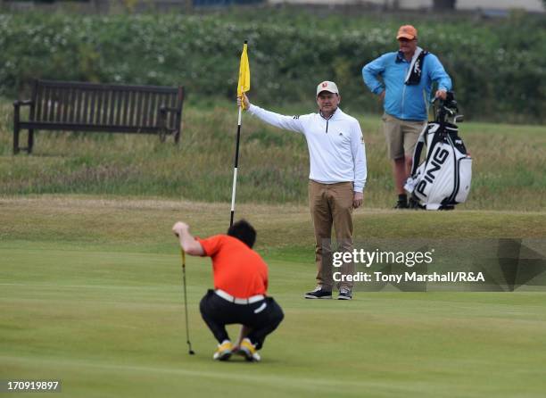 Aaron Kearney of Castlerock lines up his putt on the 1st Green during the Matchplay Third Round on the Fourth Day of The Amateur Championship at...