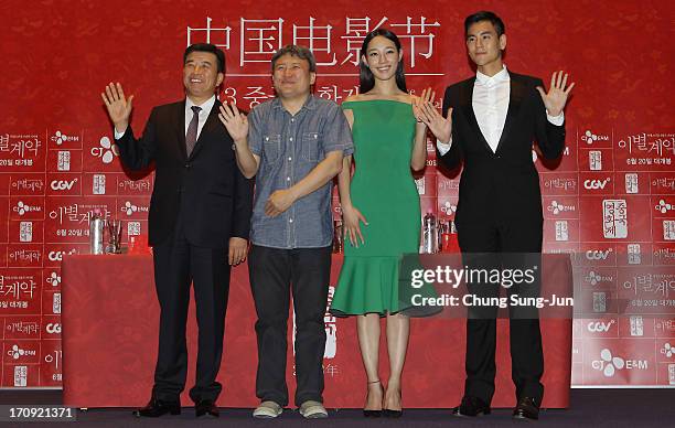 Of CJ E&M Kang Seok-Hee, director Oh Ki-Hwan, actor Eddie Peng and actress Bai Baihe attend the closing film 'A Wedding Invitation' press conference...