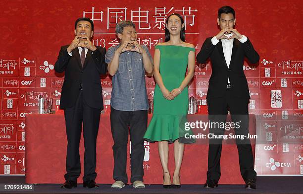 Of CJ E&M Kang Seok-Hee, director Oh Ki-Hwan, actor Eddie Peng and actress Bai Baihe attend the closing film 'A Wedding Invitation' press conference...