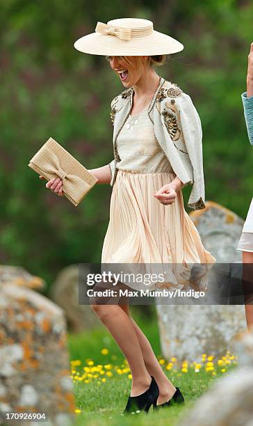 Rose van Cutsem attends the wedding of William van Cutsem and Rosie Ruck Keene at the church of St Mary the Virgin in Ewelme on May 11, 2013 near...