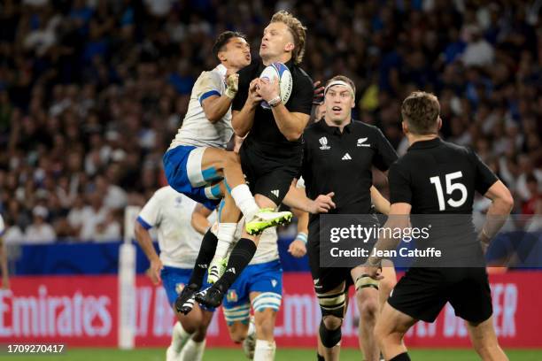 Ange Capuozzo of Italy, David Havili of New Zealand in action during the Rugby World Cup France 2023 match between New Zealand and Italy at Groupama...