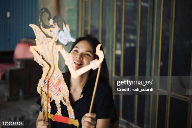 java, making shadow puppet, wayang kuli or shadow puppet - east asian works of art specialist stock pictures, royalty-free photos & images