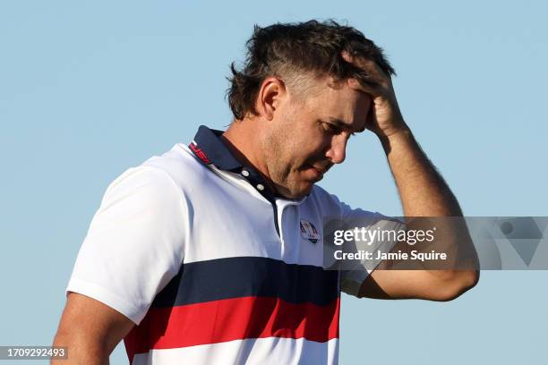 Brooks Koepka of Team United States reacts on the third hole during the Saturday morning foursomes matches of the 2023 Ryder Cup at Marco Simone Golf...