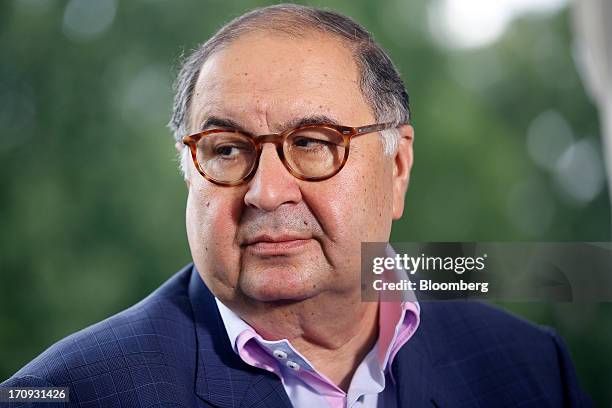 Alisher Usmanov, Russian billionaire owner of USM Holdings Ltd., pauses during a Bloomberg Television interview on the opening day of the St....