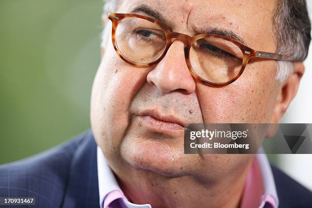 Alisher Usmanov, Russian billionaire owner of USM Holdings Ltd., pauses during a Bloomberg Television interview on the opening day of the St....