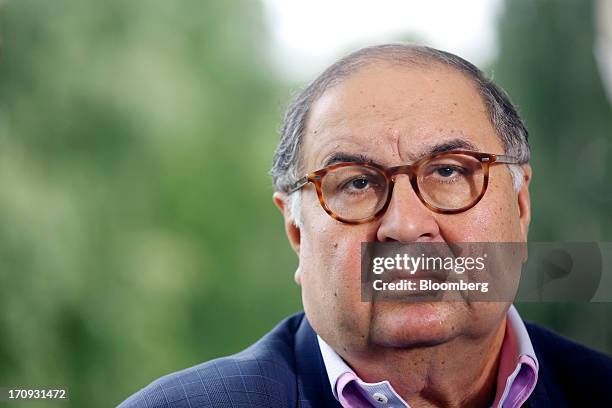 Alisher Usmanov, Russian billionaire owner of USM Holdings Ltd., pauses during a Bloomberg Television interview on the opening day of the St....