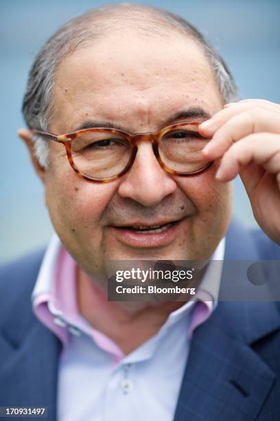Alisher Usmanov, Russian billionaire owner of USM Holdings Ltd., poses for a photograph on the opening day of the St. Petersburg International...