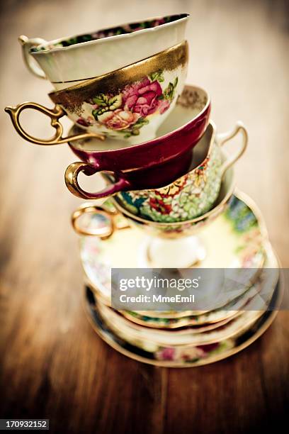 tea time - stacked tea cups stock pictures, royalty-free photos & images