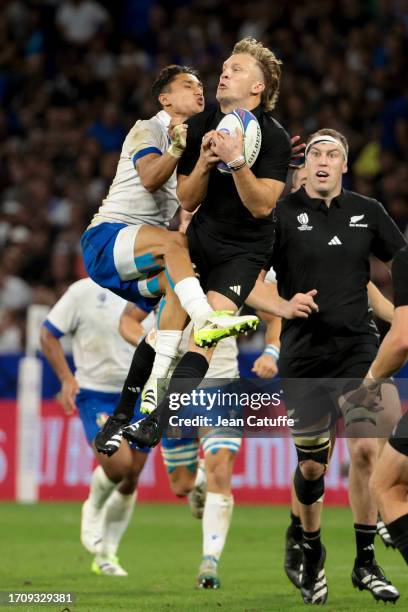 Ange Capuozzo of Italy, David Havili of New Zealand in action during the Rugby World Cup France 2023 match between New Zealand and Italy at Groupama...