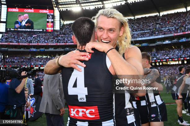 Darcy Moore of the Magpies celebrates winning with Brayden Maynard of the Magpies during the 2023 AFL Grand Final match between Collingwood Magpies...