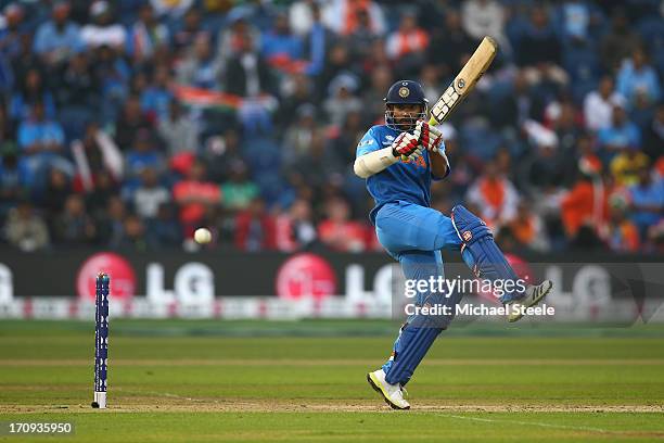 Shikhar Dhawan of India pulls a shot behind square during the ICC Champions Trophy Semi-Final match between India and Sri Lanka at the SWALEC Stadium...