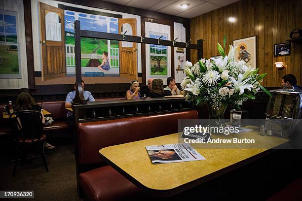 The booth at which the final scene of the final episode of the HBO show, "The Sopranos," was filmed, is seen at Holsten's restaurant on June 20, 2013...