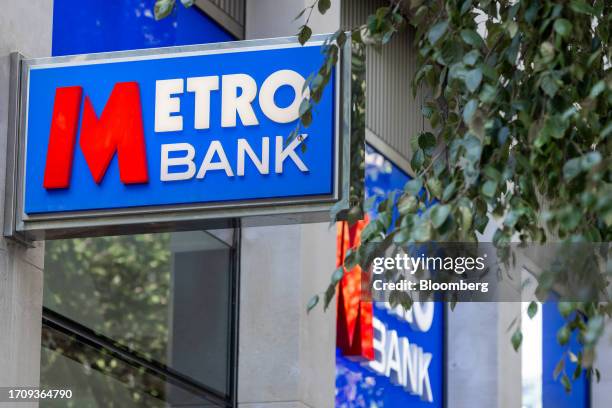 Sign at a Metro Bank Holdings Plc branch in London, UK, on Friday, Oct. 6, 2023. A group of Metro Bank Holdings Plc's bondholders approached the...