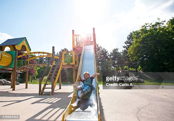 boy at playground - playground stock pictures, royalty-free photos & images