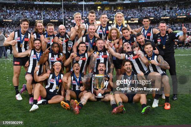 Collingwood players celebrate winning the premiership during the 2023 AFL Grand Final match between Collingwood Magpies and Brisbane Lions at...