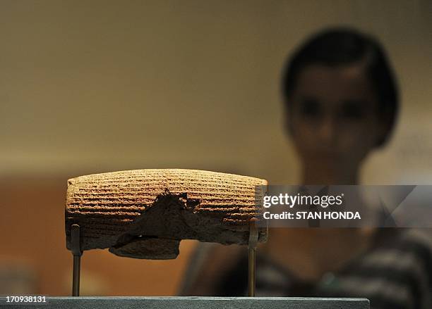 The Cyrus Cylinder, Achaemenid, 539-538 B.C., excavated at Babylon, Iraq on display in "The Cyrus Cylinder and Ancient Persia: Charting a New Empire"...