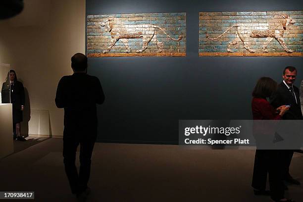People walk through the traveling exhibition The Cyrus Cylinder and Ancient Persia: Charting a New Empire at The Metropolitan Museum of Art on June...