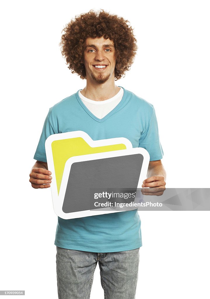 Smiling young man holding folder sign isolated on white background.