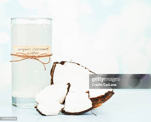 organic coconut water with pulp - coconut water stock pictures, royalty-free photos & images