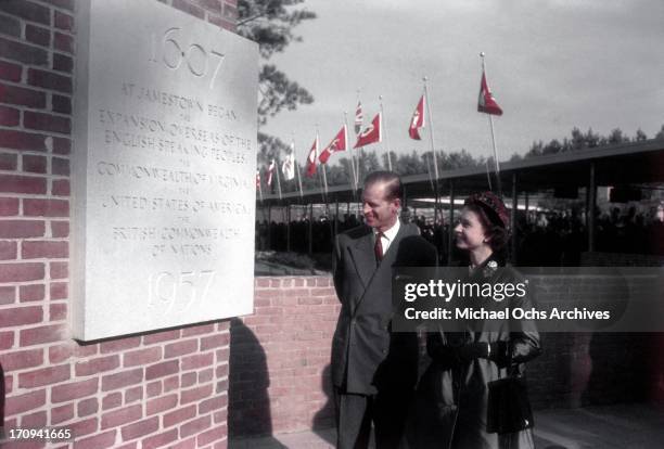 Queen Elizabeth II and Prince Philip, Duke of Edinburgh look at a plaque commerorating the 350th anniverasy of the founding of the Jamestown colony...