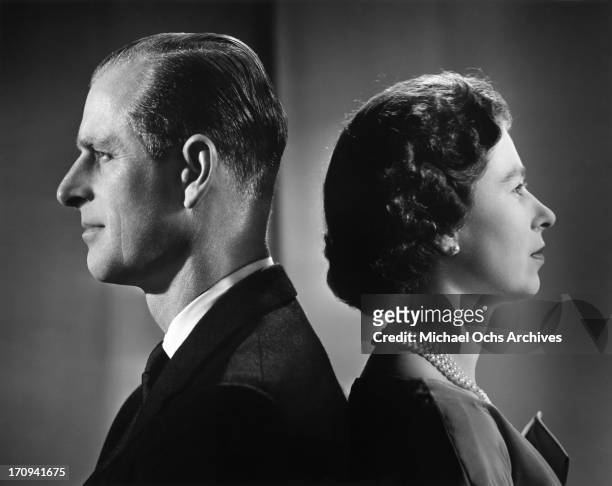 Queen Elizabeth II and Prince Philip, Duke of Edinburgh pose for a portrait, Buckingham Palace, London, December 1958.