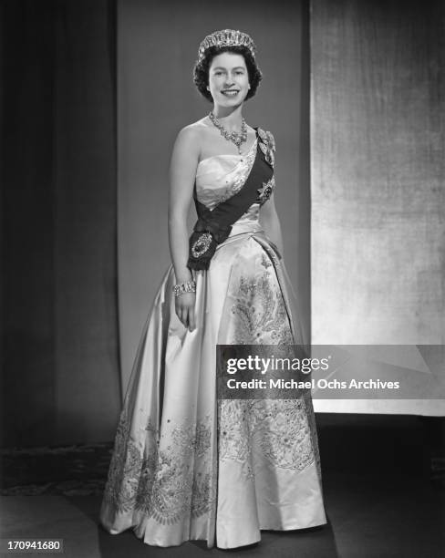 Queen Elizabeth II poses for a portrait at home in Buckingham Palace in December 1958 in London, England.