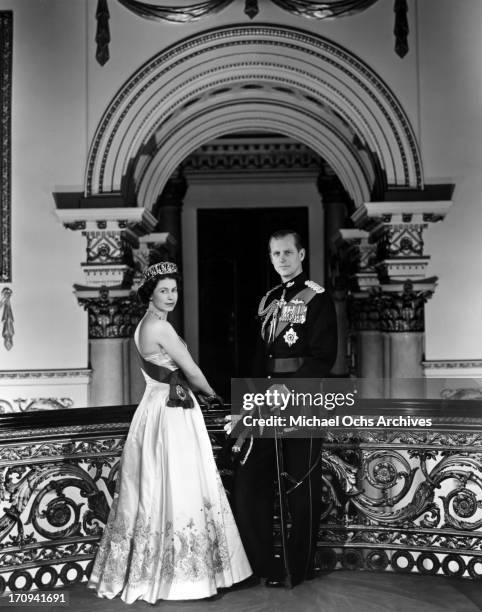 Queen Elizabeth II and Prince Philip, Duke of Edinburgh pose for a portrait at home in Buckingham Palace in December 1958 in London, England.
