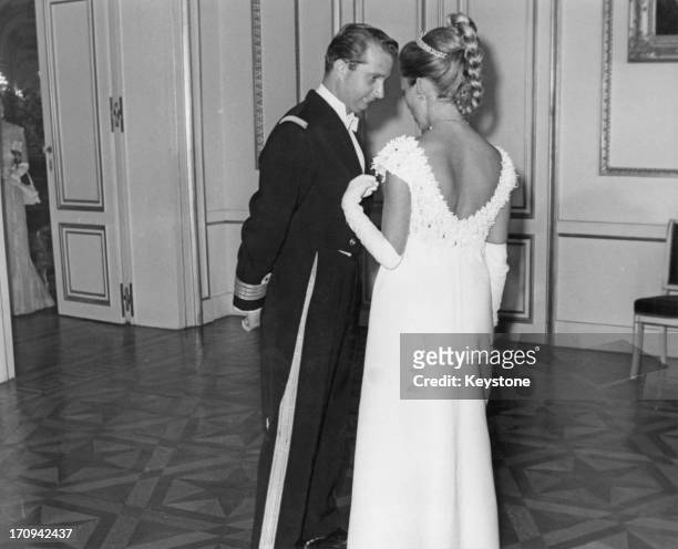 Prince Albert of Belgium, later King Albert II of Belgium and Princess Paola of Belgium have a quiet word together before the State Dinner with Queen...