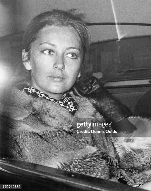 Princess Paola of Belgium at Heathrow Airport with her husband Prince Albert of Belgium, later King Albert II of Belgium. The couple are in London as...