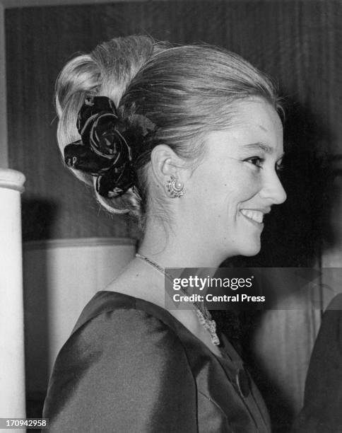 Princess Paola of Belgium attends a banquet at the Carlton Towers being held in honour of Prince Alfred of Belgium, London, 17th March 1964.