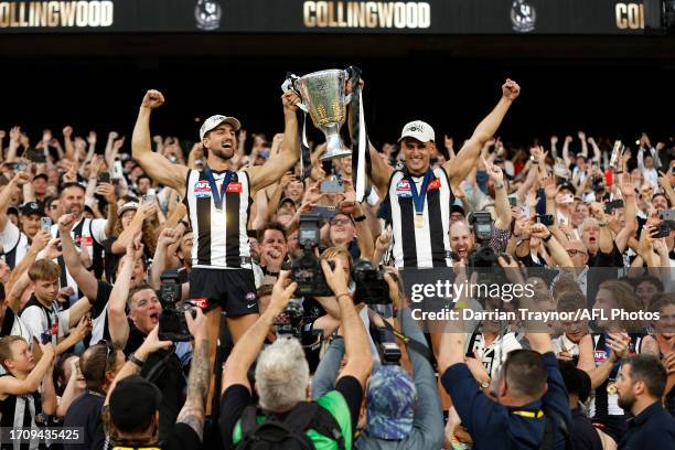 Josh and Nick Daicos celebrate after the 2023 AFL Grand Final match between Collingwood Magpies and Brisbane Lions at Melbourne Cricket Ground, on...