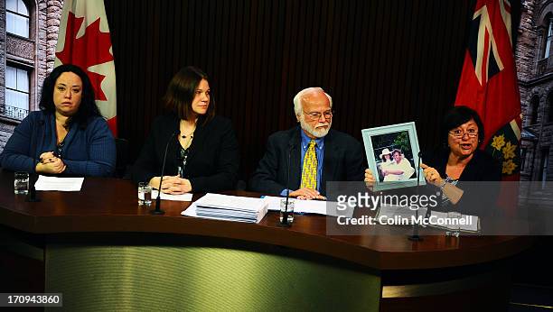 Speaking at a press conference l to r Miranda Ferrier,Jennifer Burgess ,Bob Gadsby listen to Helen Benoit as she holds up a picture of her momAspasia...